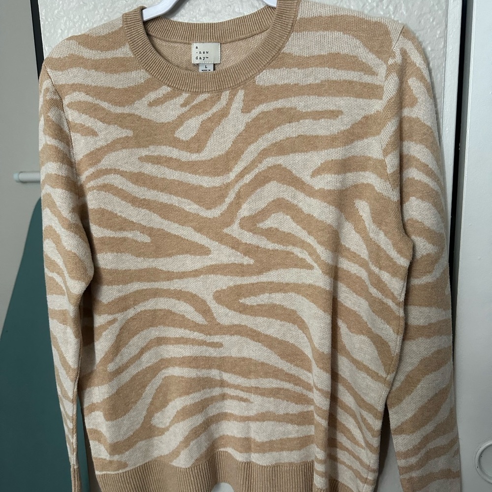 A New Day sweater